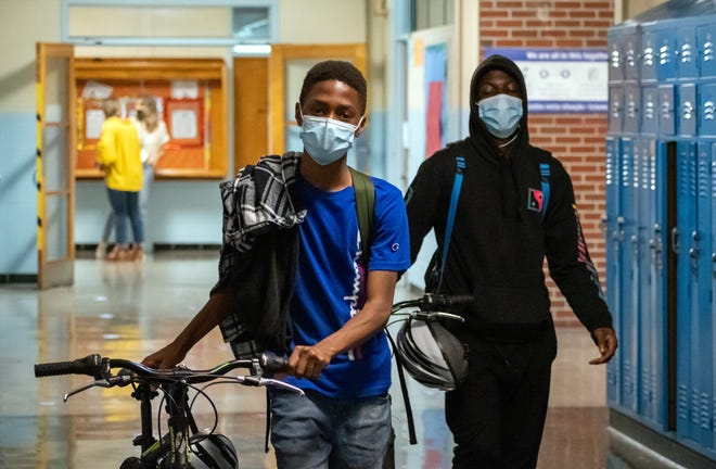 Teenagers with donated bikes