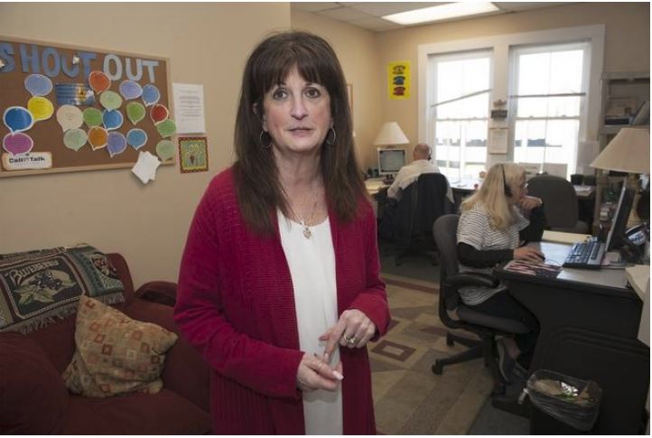 Program Director Eileen Davis, who launched Call2Talk in December of 2013, says a huge increase in calls fielded has put the Framingham organization at a "tipping point" in need of additional volunteers and funding [Daily News and Wicked Local Staff Photo / Art Illman]