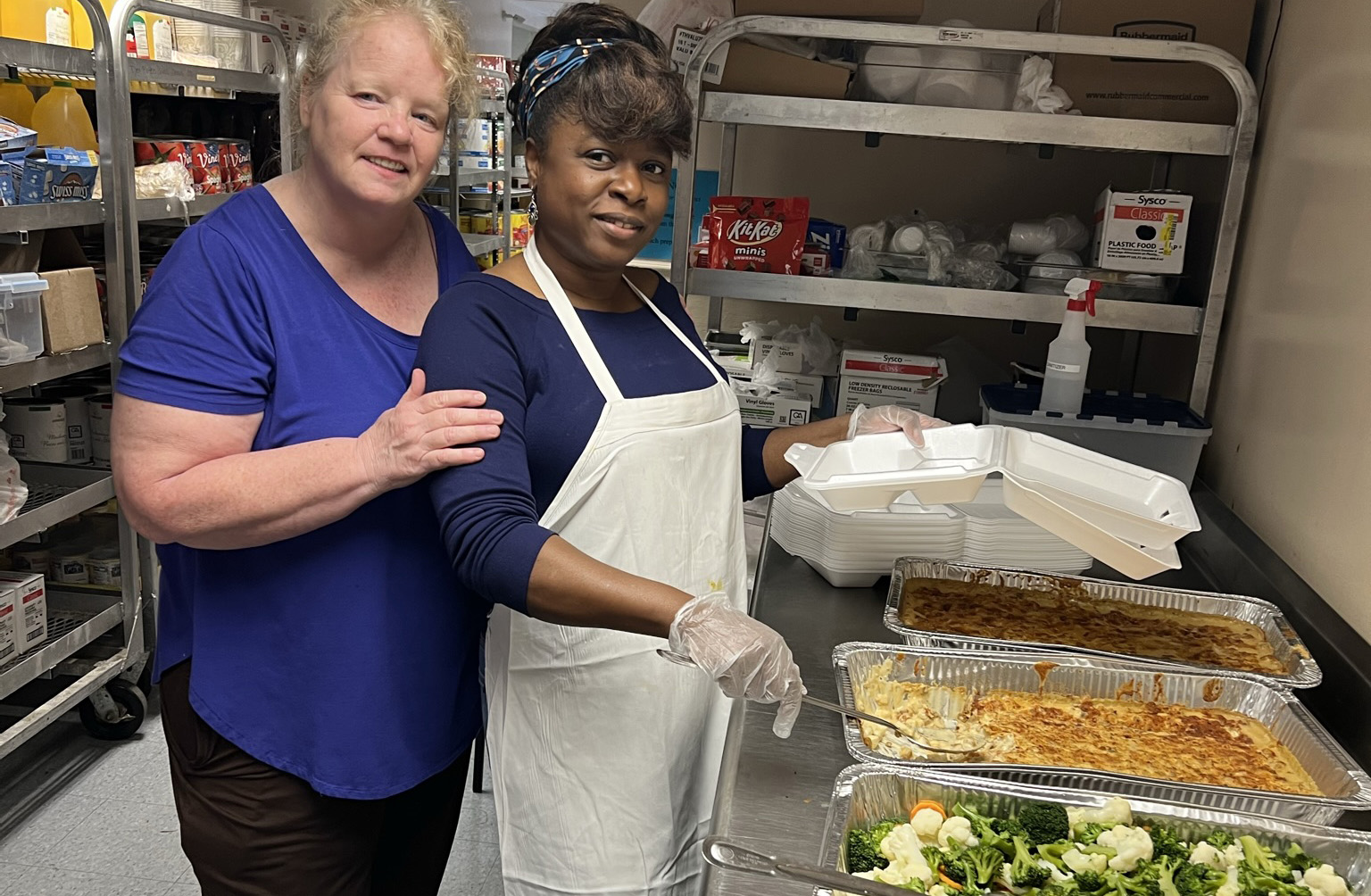 Chef Vicki and Mona Cook for Haitian asylum seekers