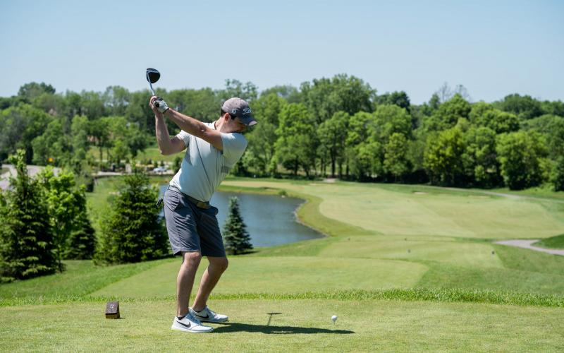 Golfer Teeing off