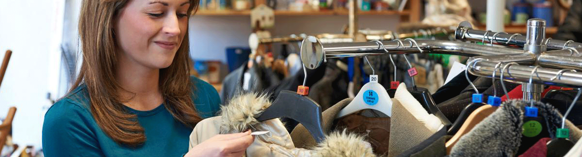 Woman shops in thrift store