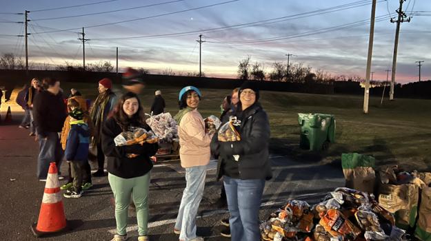 Volunteers ready for the drive thru thanksgiving meal distribution in Clinton
